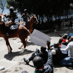Kenyan police use tear gas during a demonstration against suspected kidnappings by the government.